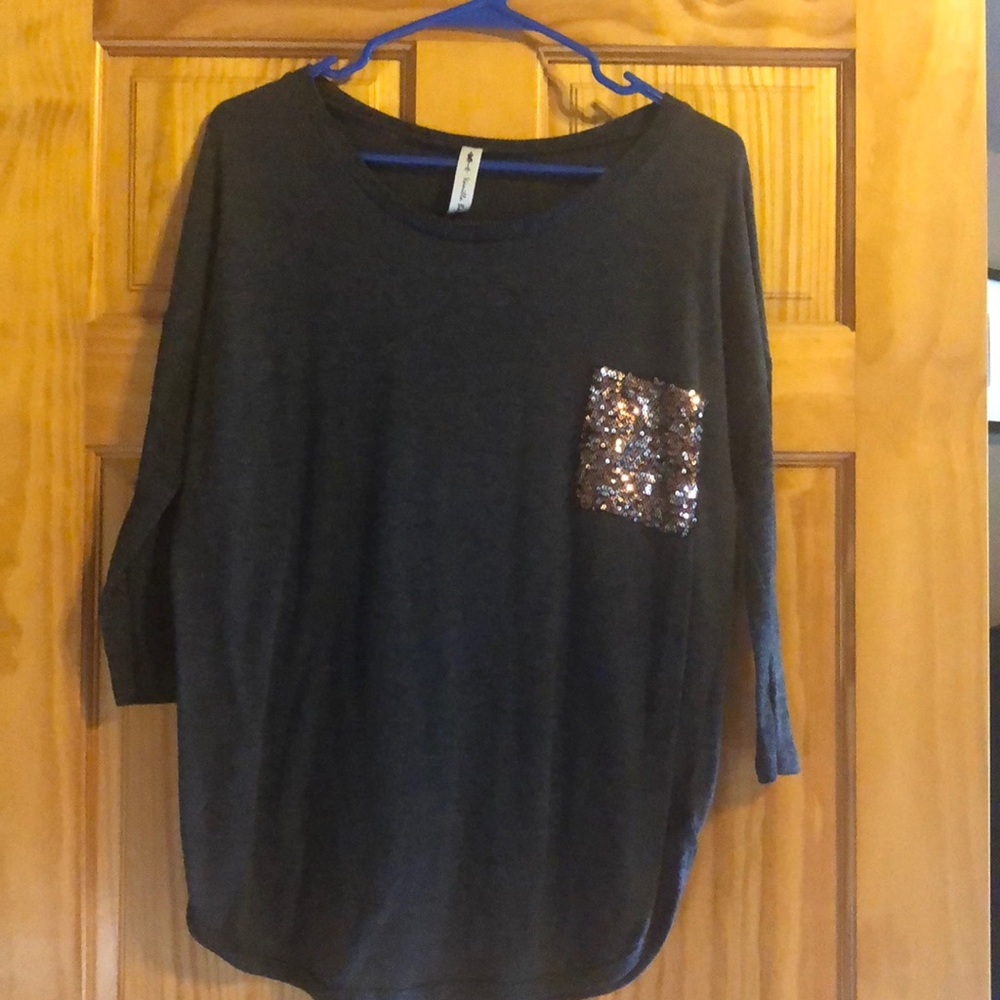 Long sleeve blouse with glittery pocket